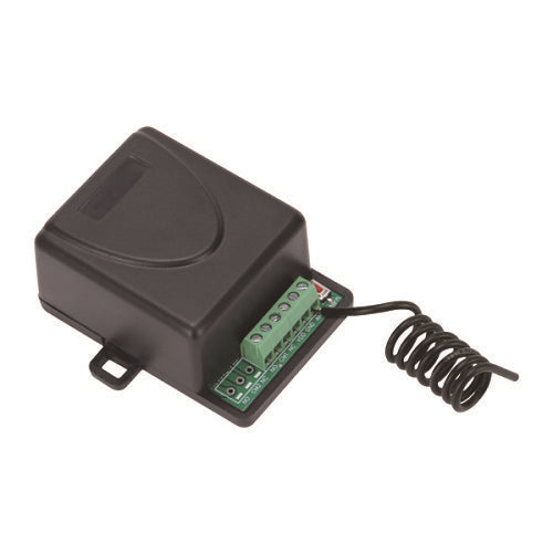 Black electronic device with green circuit board and coiled cable on a white background