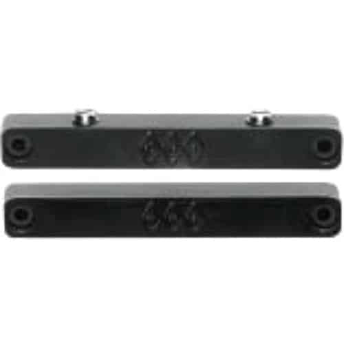 Two black metal contacts on a white background