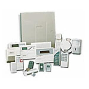 Collection of electronic home security devices on a white background