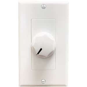White wall switch with a rotary control on a white background