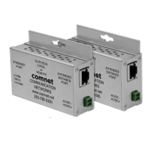 Two metallic devices with Ethernet ports labeled 'Comnet' on a white background.