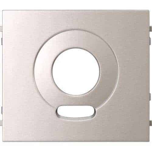 Metallic intercom camera cover plate on a white background