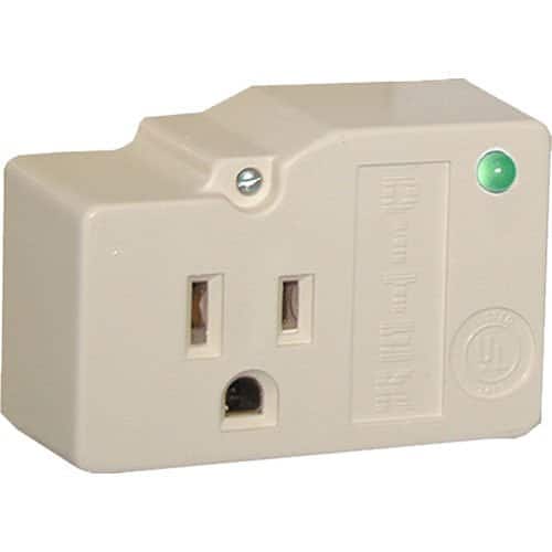 Beige electrical outlet with green indicator light on a white background