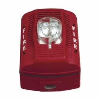 Red fire alarm with clear lens on a white background