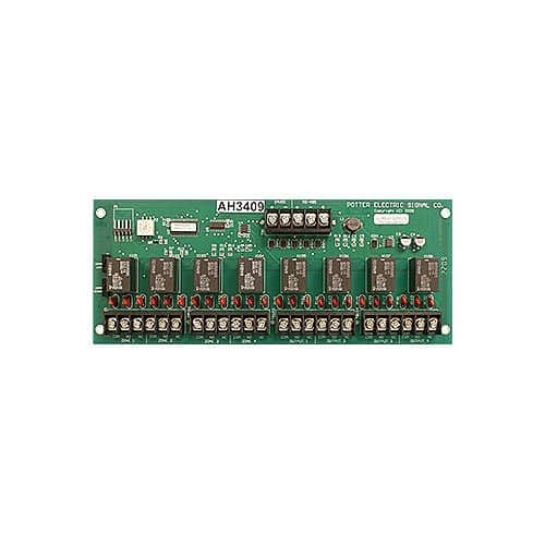 Circuit board with multiple components on a green background
