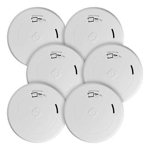 Six white smoke detectors arranged in a circular pattern on a white background