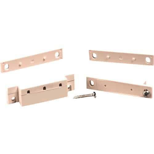 Set of metal brackets with screws on a white background