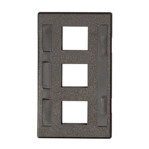 Decorative wall plate with four square cutouts on a white background