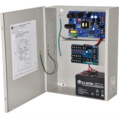 Electrical panel with wiring and components, including a battery, on a white background.