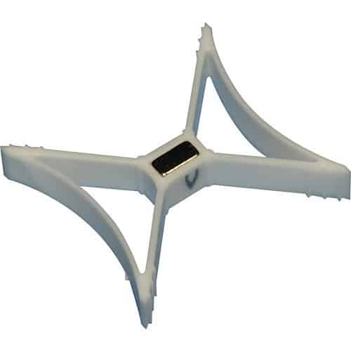 White plastic component with a central black square on a white background