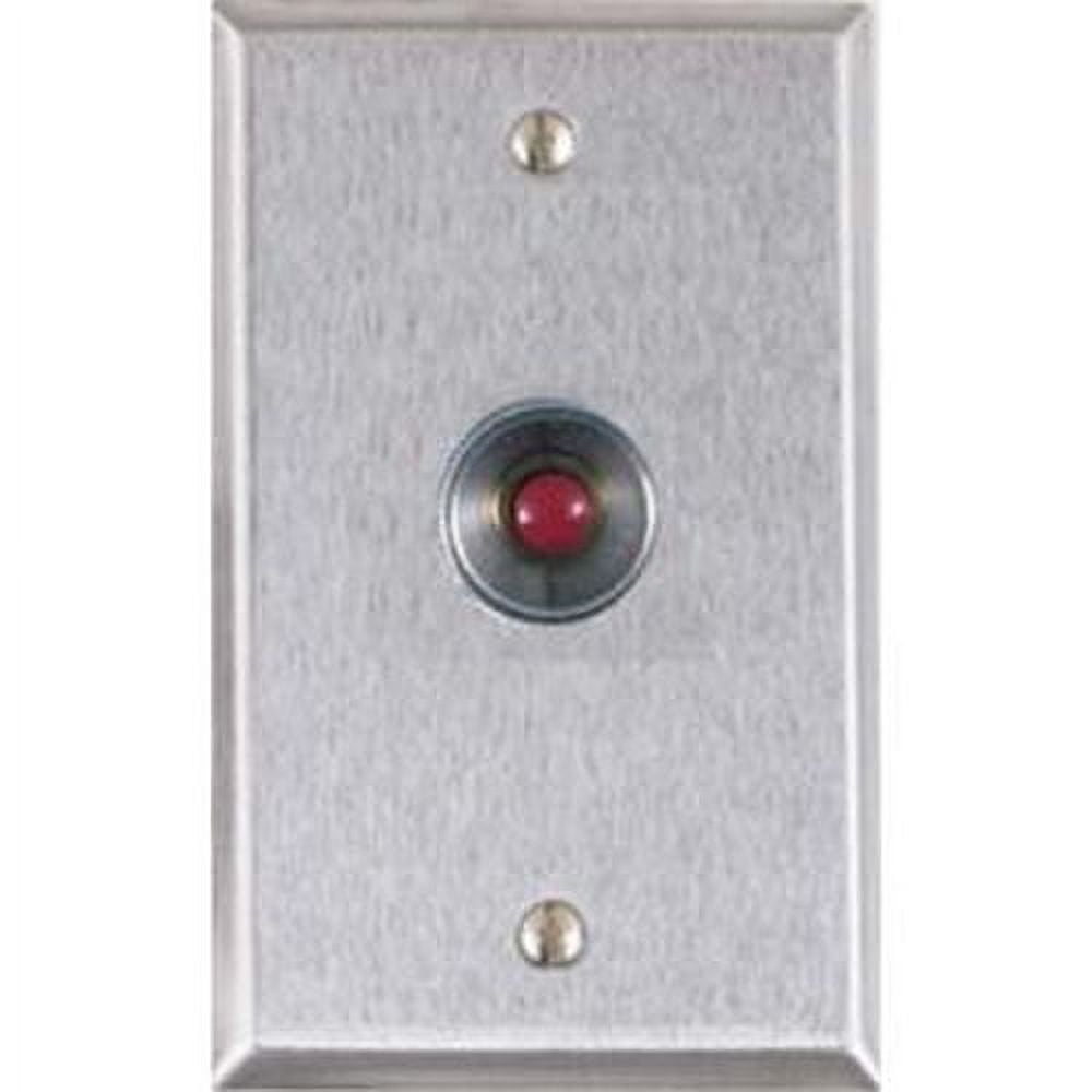 Metallic push button switch with a red button on a textured silver background