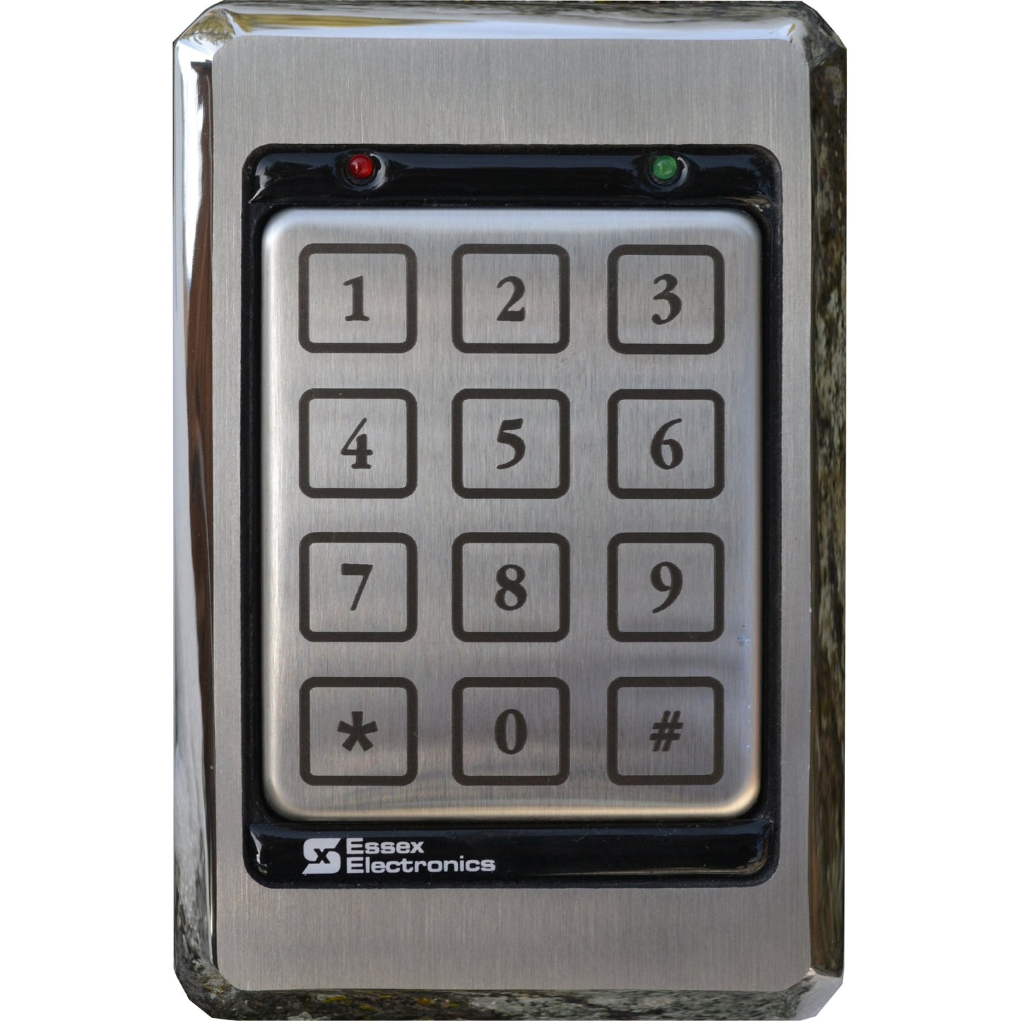 Metal keypad with number buttons and symbols on white background