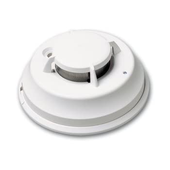 White smoke detector on a white background