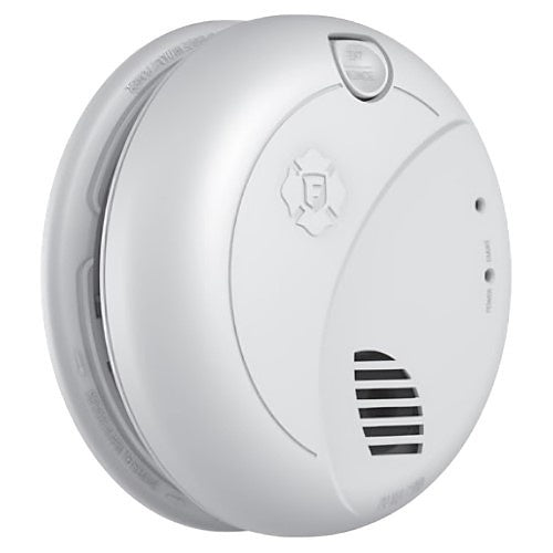 A white round smoke detector with a silver metallic outer ring, featuring a button on top, a fire department emblem, and a vented grille on the front, isolated on a white background.