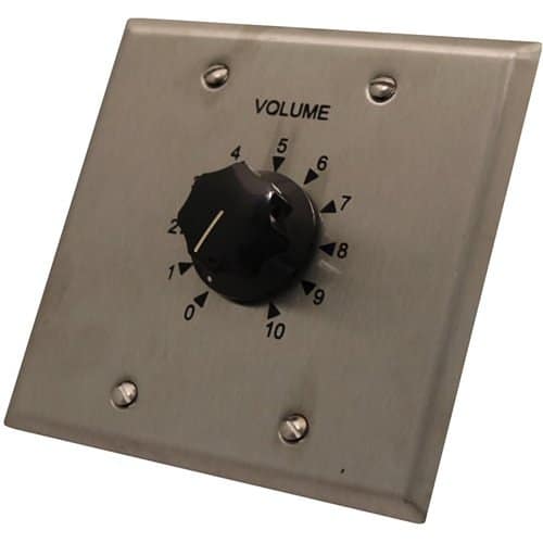 Volume control knob on a metallic panel with 'VOLUME' text