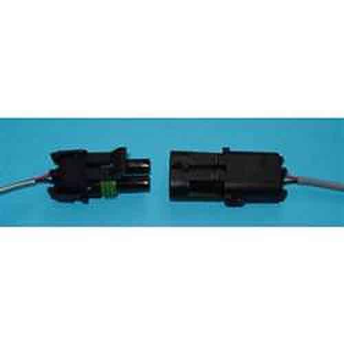 Two black electronic components on a blue background