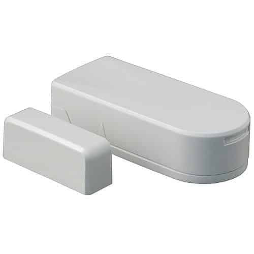 White magnetic door sensor on a white background