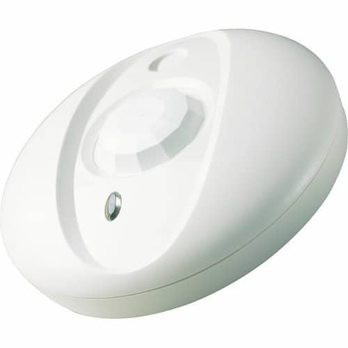Close-up photograph of a white, oval-shaped security sensor designed for ceiling or wall mounting