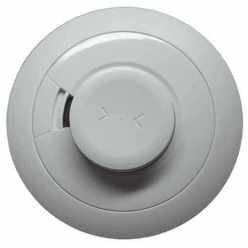 White smoke detector on a white background