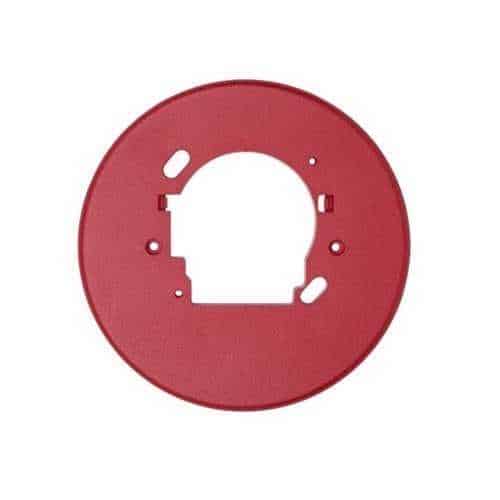 Red circular disc with a white cutout shape on a white background