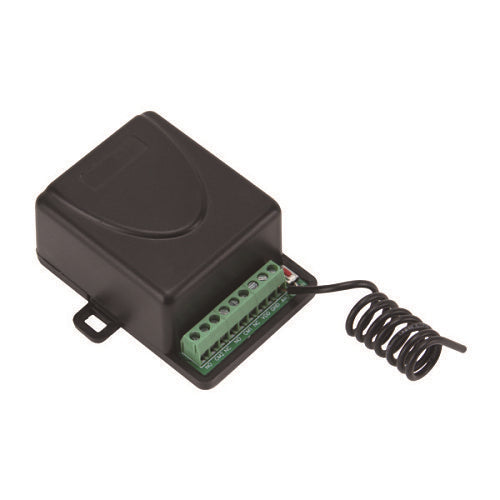Black electronic device with green circuit board and coiled cable on a white background