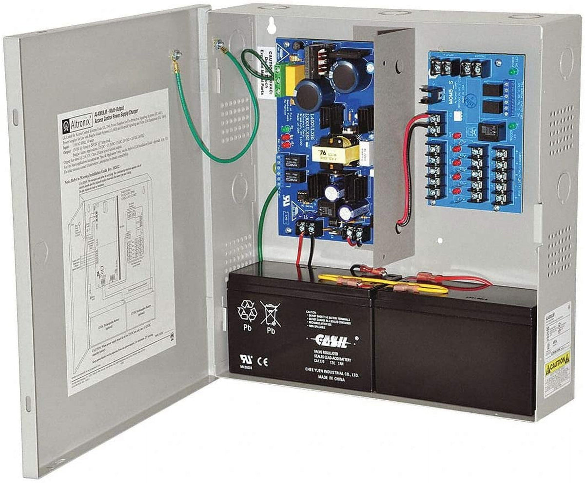 Electrical panel with wiring and components, featuring a battery and control board.