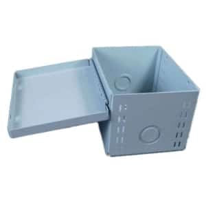 A light gray, cube-shaped utility box on a white background