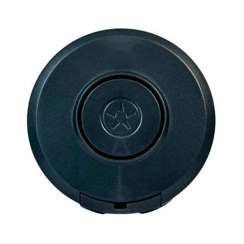 Black circular object with a star emblem on a white background