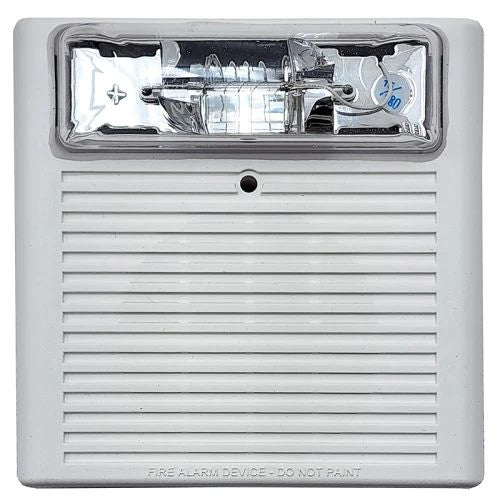 Fire alarm device with a clear lens cover on a white background