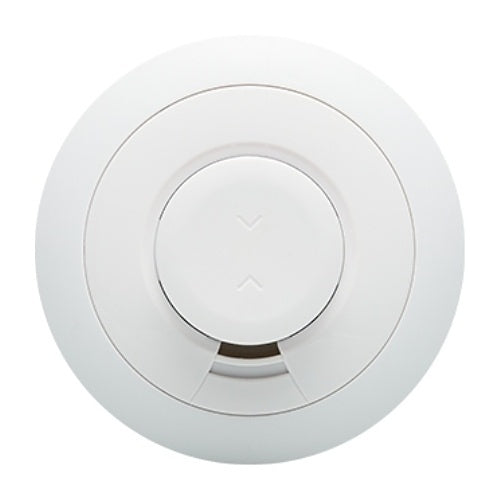 White smoke detector on a white background