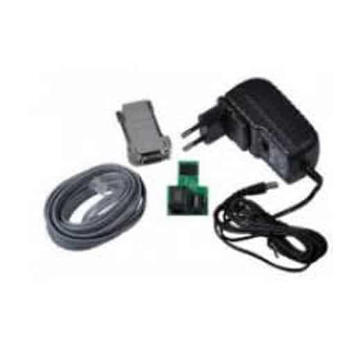 Set of electronic components including a power adapter, cable, and connectors on a white background