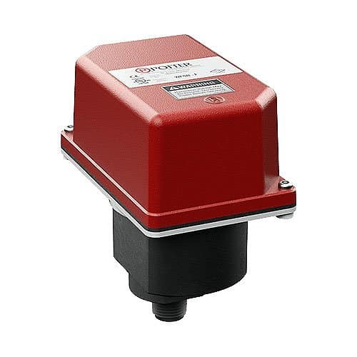 Red and black industrial valve actuator on a white background