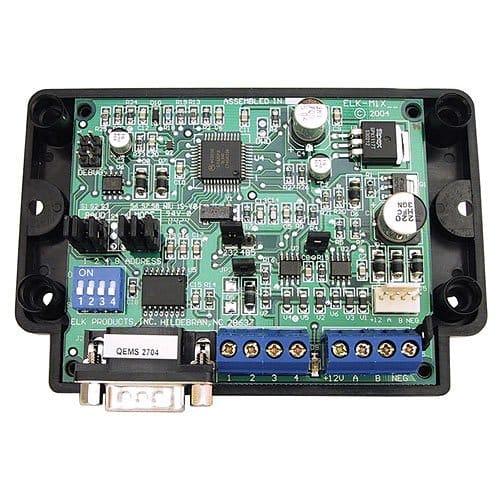 Electronic circuit board with various components on a white background