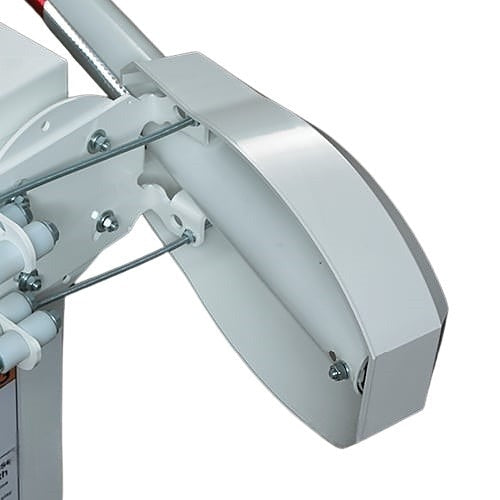 Close-up of a mechanical component with gears and metal parts on a white background