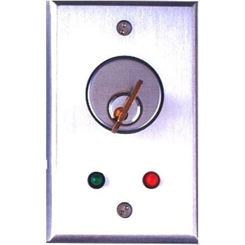 Control panel with a key hole and indicator lights on a white background