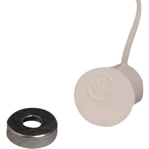 White sensor with a black magnet on a white background