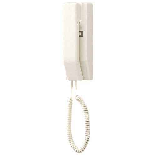 White wall-mounted phone with coiled cord on a white background