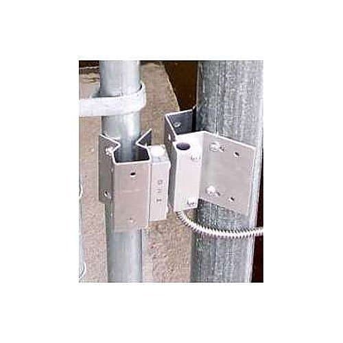 Metal bracket attached to a vertical pipe with a white background