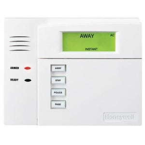 Honeywell security system panel with various buttons and a green display on a white background