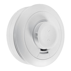 White, circular smoke and heat detector on a white background