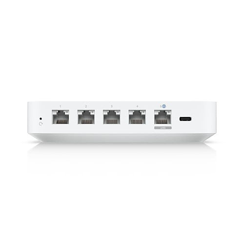 Rear panel of a compact, rectangular networking device made of white plastic on a white background