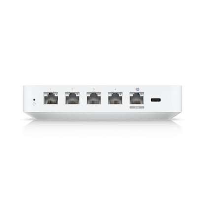 Rear panel of a compact, rectangular networking device made of white plastic on a white background
