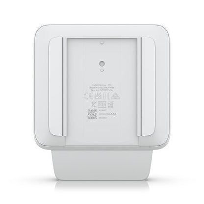 White electronic device with a label on a white background