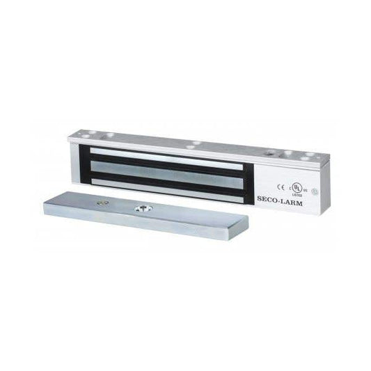 A Seco-Larm electronic door stopper shown in two views: one installed on a metal rail and one loose piece, both in a silver anodized aluminum finish with black accents.