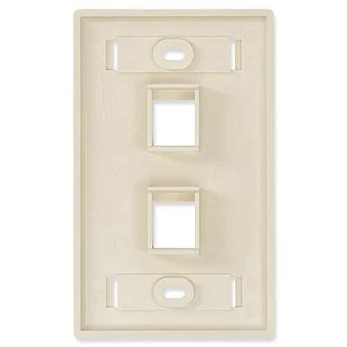 Beige wall plate with multiple switch and outlet openings on a white background
