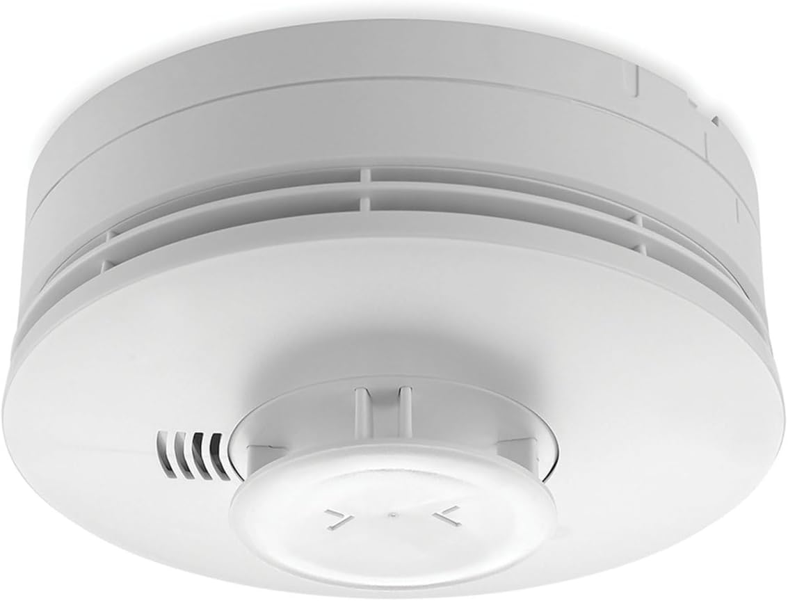 White smoke detector on a white background