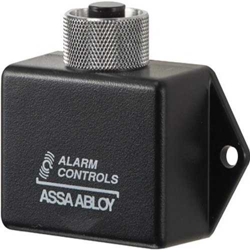 Black alarm control module with metal knob on a white background, featuring Assa Abloy logo.
