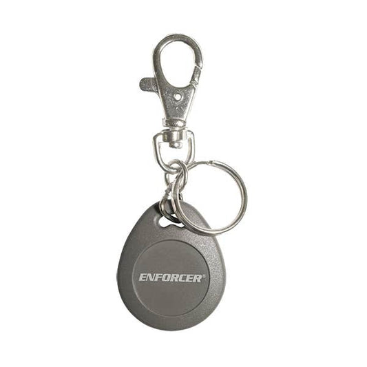 A silver metal keychain tag with a swivel clasp and split key ring, featuring the brand name 'ENFORCER' printed in white on the front, set against a plain white background.