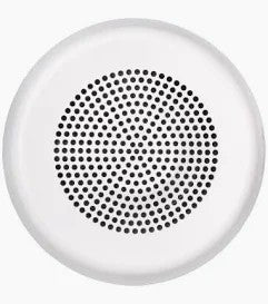 White round speaker with black perforated design on a white background